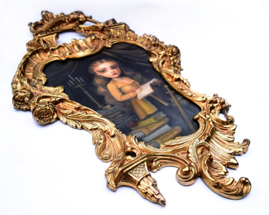 Karla Pereira gold frame Belle