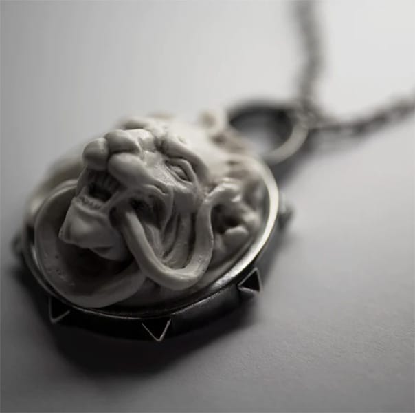 macabre-objects-lion-snake