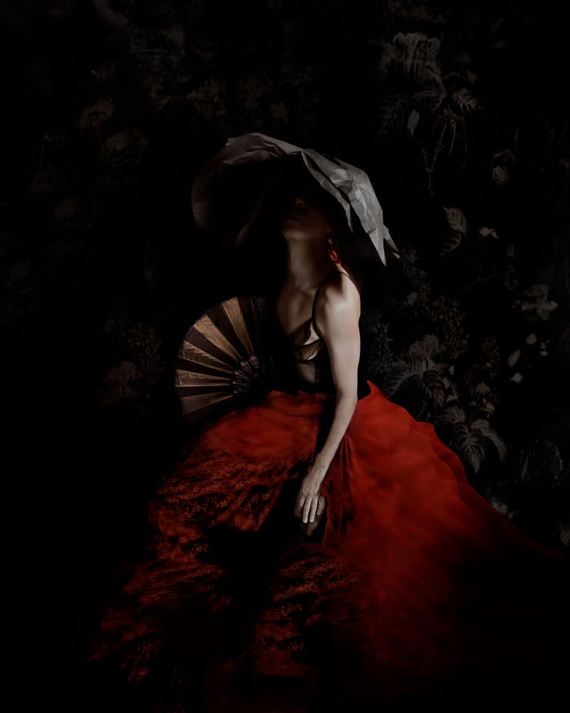 Diego Orlando painting of woman in red dress