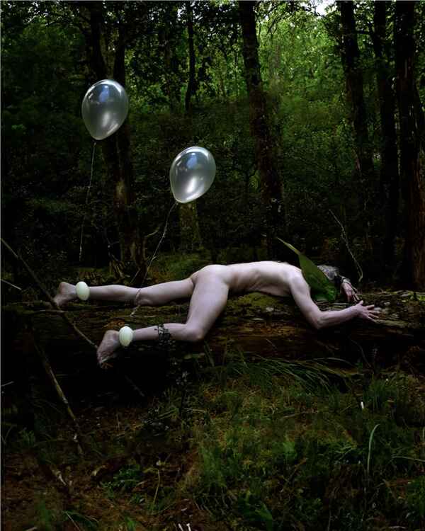 Diego Orlando painting of fallen figure in forest