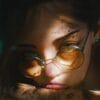 VZEWL's 3D artwork of a woman with glasses and tattoo on her face