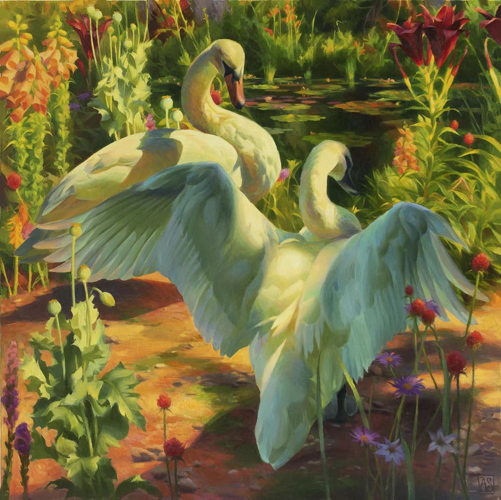Two swans in a vibrant garden